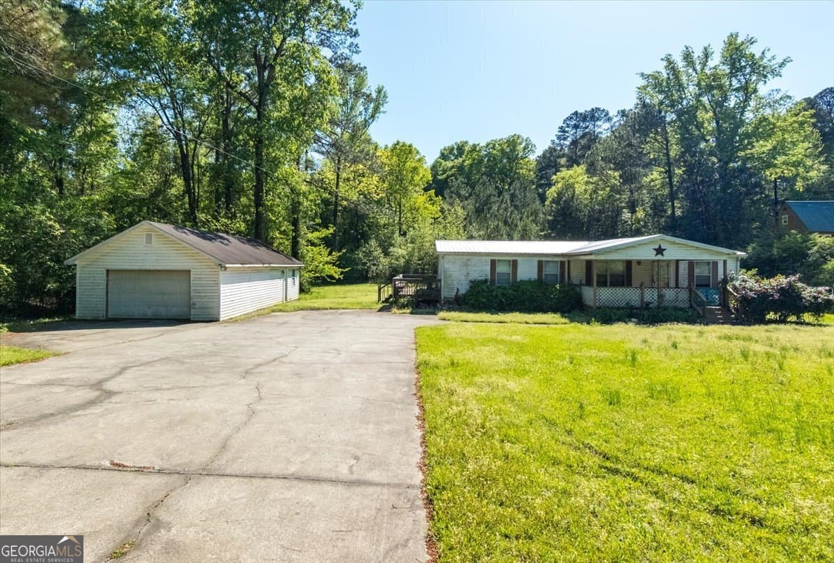 3 bedroom, 2 bathroom, 1,344 sq ft manufactured home,single family residence sold at 504 Old Huckabee Road, Gray, GA 31032