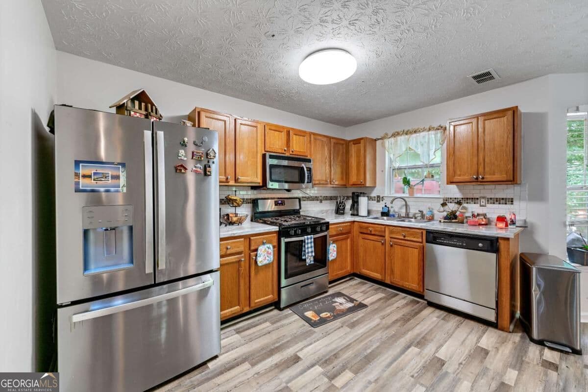 3 bedroom, 2.5 bathroom, 1,812 sq ft condominium for sale at 248 Springbottom Drive, Lawrenceville, GA 30046 — photo 6