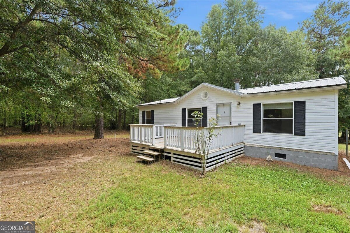 3 bedroom, 2 bathroom, 1,056 sq ft manufactured home,single family residence for sale at 312 Blounts Chapel Road, Haddock, GA 31033 — photo 2