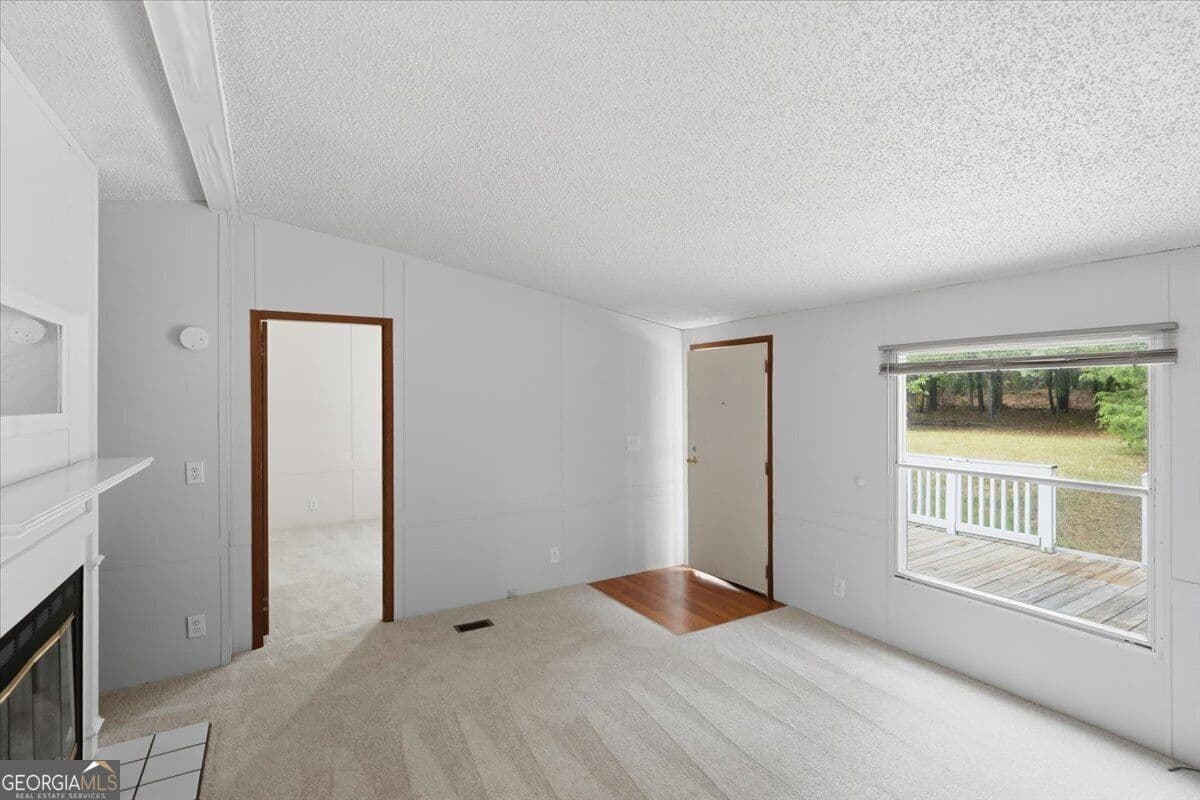 3 bedroom, 2 bathroom, 1,056 sq ft manufactured home,single family residence for sale at 312 Blounts Chapel Road, Haddock, GA 31033 — photo 6