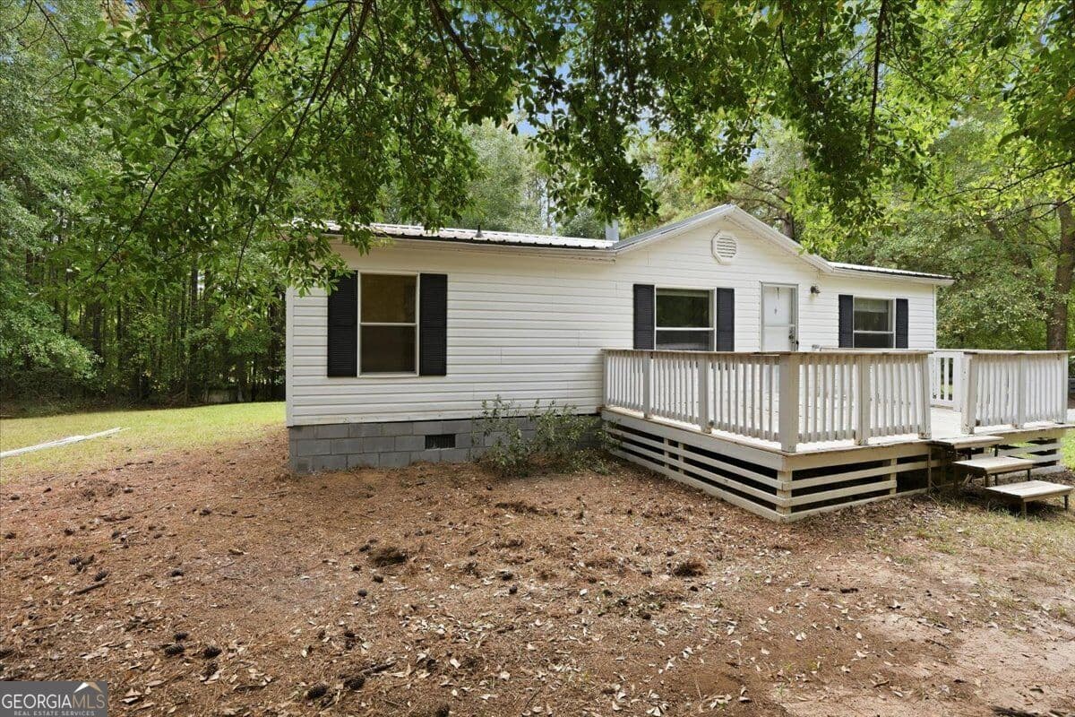 3 bedroom, 2 bathroom, 1,056 sq ft manufactured home,single family residence for sale at 312 Blounts Chapel Road, Haddock, GA 31033 — photo 3