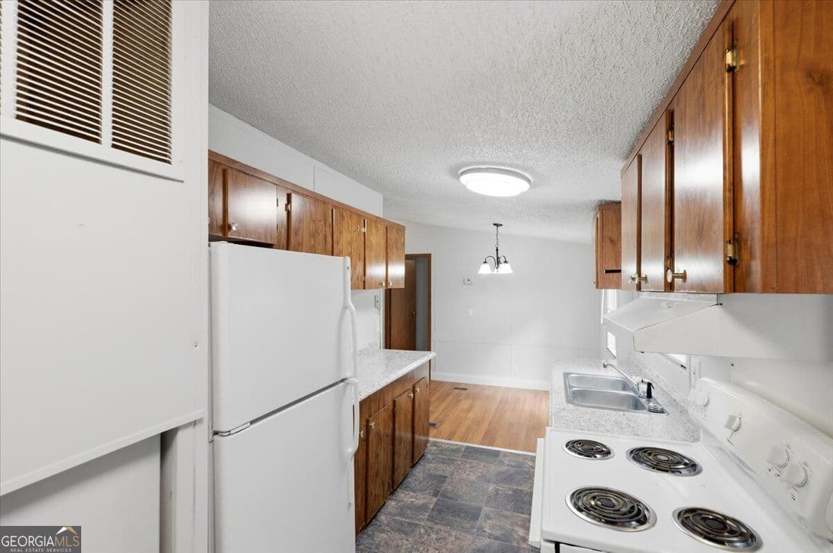 3 bedroom, 2 bathroom, 1,056 sq ft manufactured home,single family residence for sale at 312 Blounts Chapel Road, Haddock, GA 31033 — photo 9
