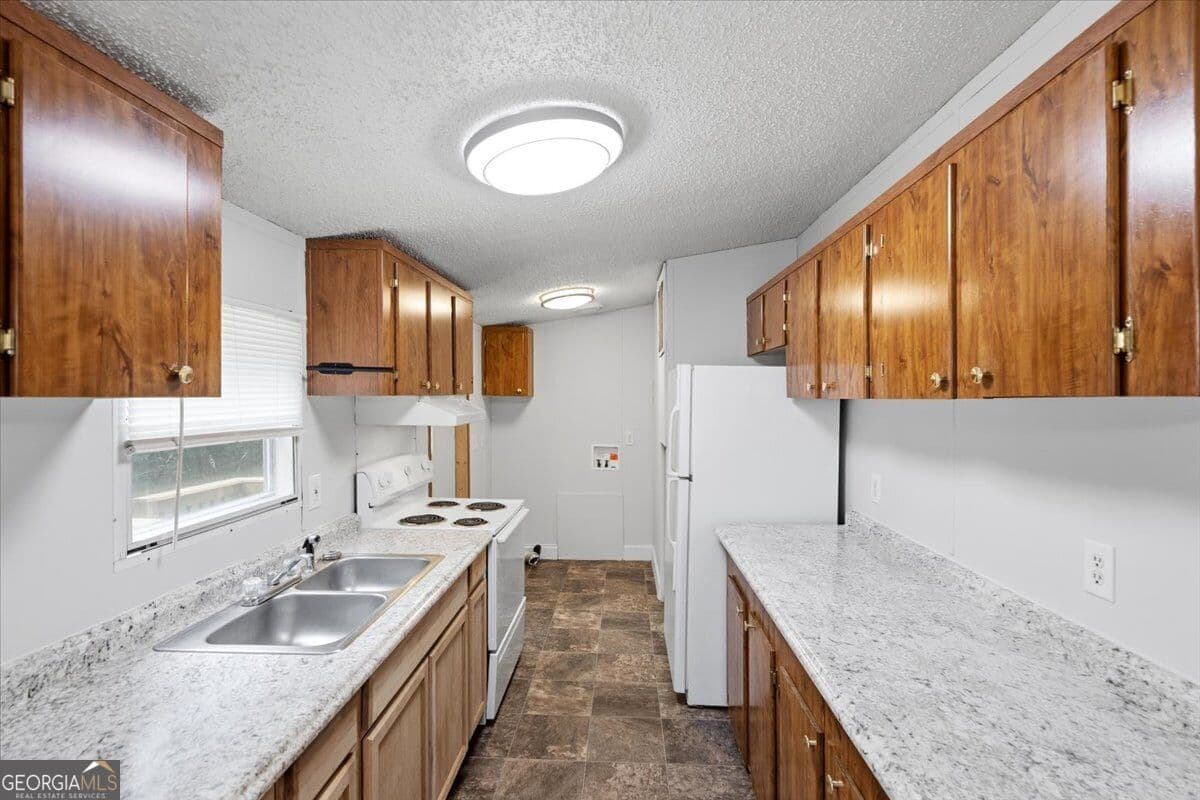 3 bedroom, 2 bathroom, 1,056 sq ft manufactured home,single family residence for sale at 312 Blounts Chapel Road, Haddock, GA 31033 — photo 8
