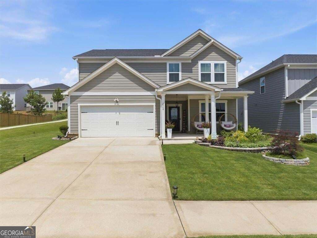 4 bedroom, 2.5 bathroom, 2,313 sq ft single family residence for sale at 2268 Blackbird Circle, Covington, GA 30016 — photo 2
