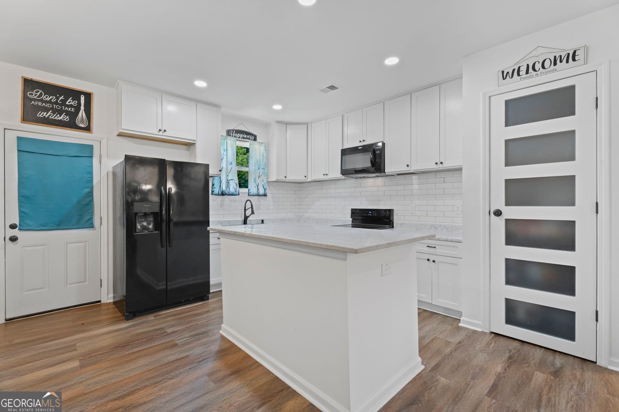 4 bedroom, 3 bathroom, 2,055 sq ft single family residence for sale at 8290 San Jose Trail, Jonesboro, GA 30236 — photo 3