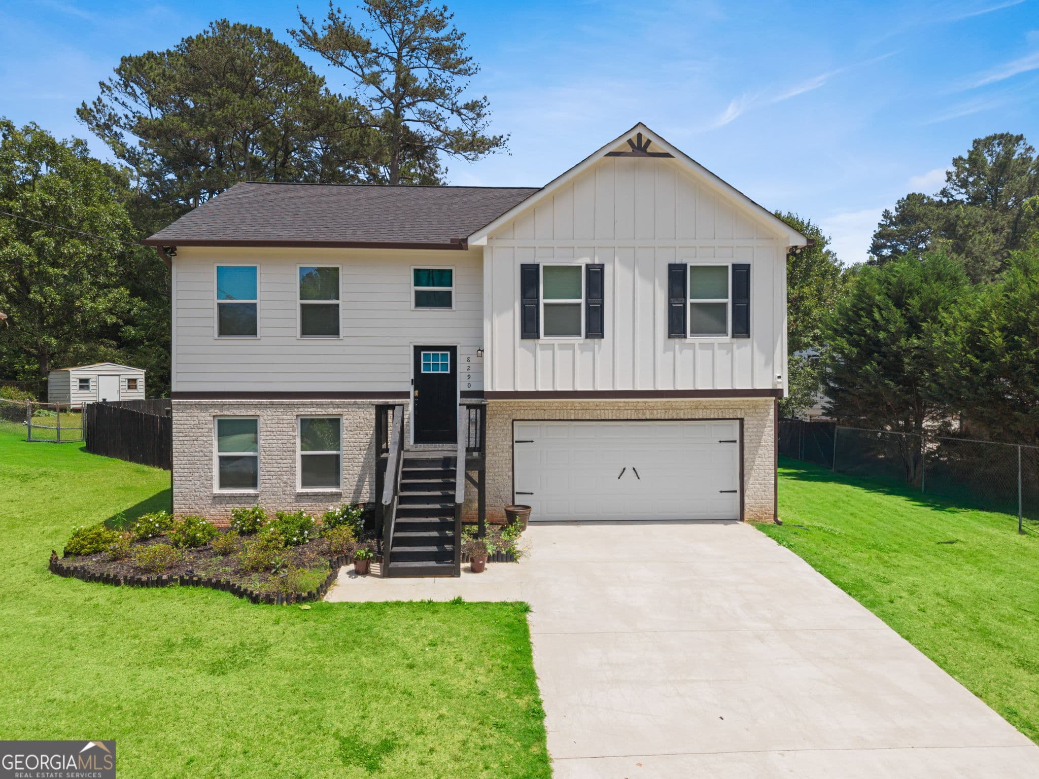 4 bedroom, 3 bathroom, 2,055 sq ft single family residence for sale at 8290 San Jose Trail, Jonesboro, GA 30236 — photo 1 of 19
