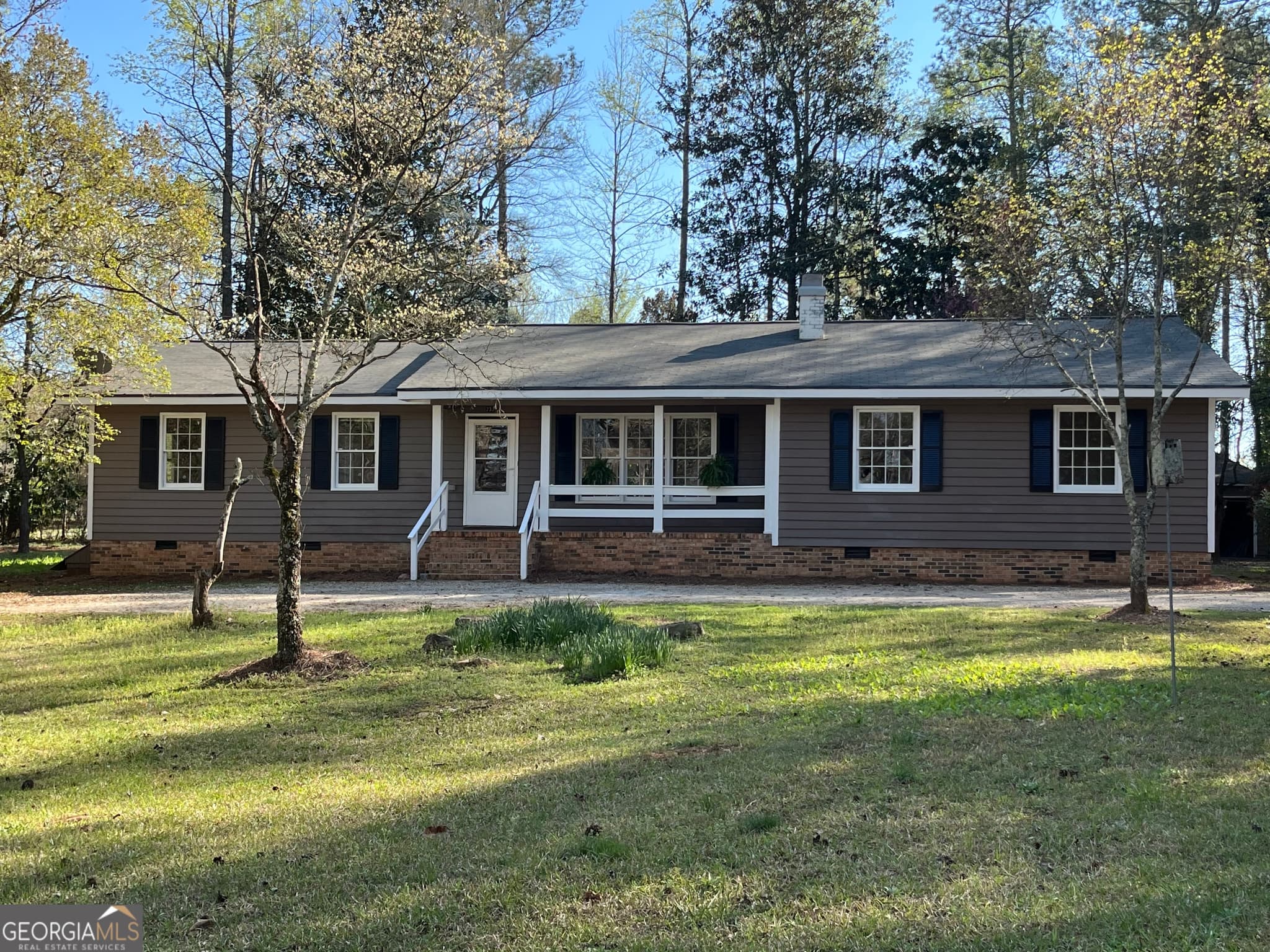 4 bedroom, 2 bathroom, 2,300 sq ft single family residence sold at 233 George Coggin Road, Newnan, GA 30265