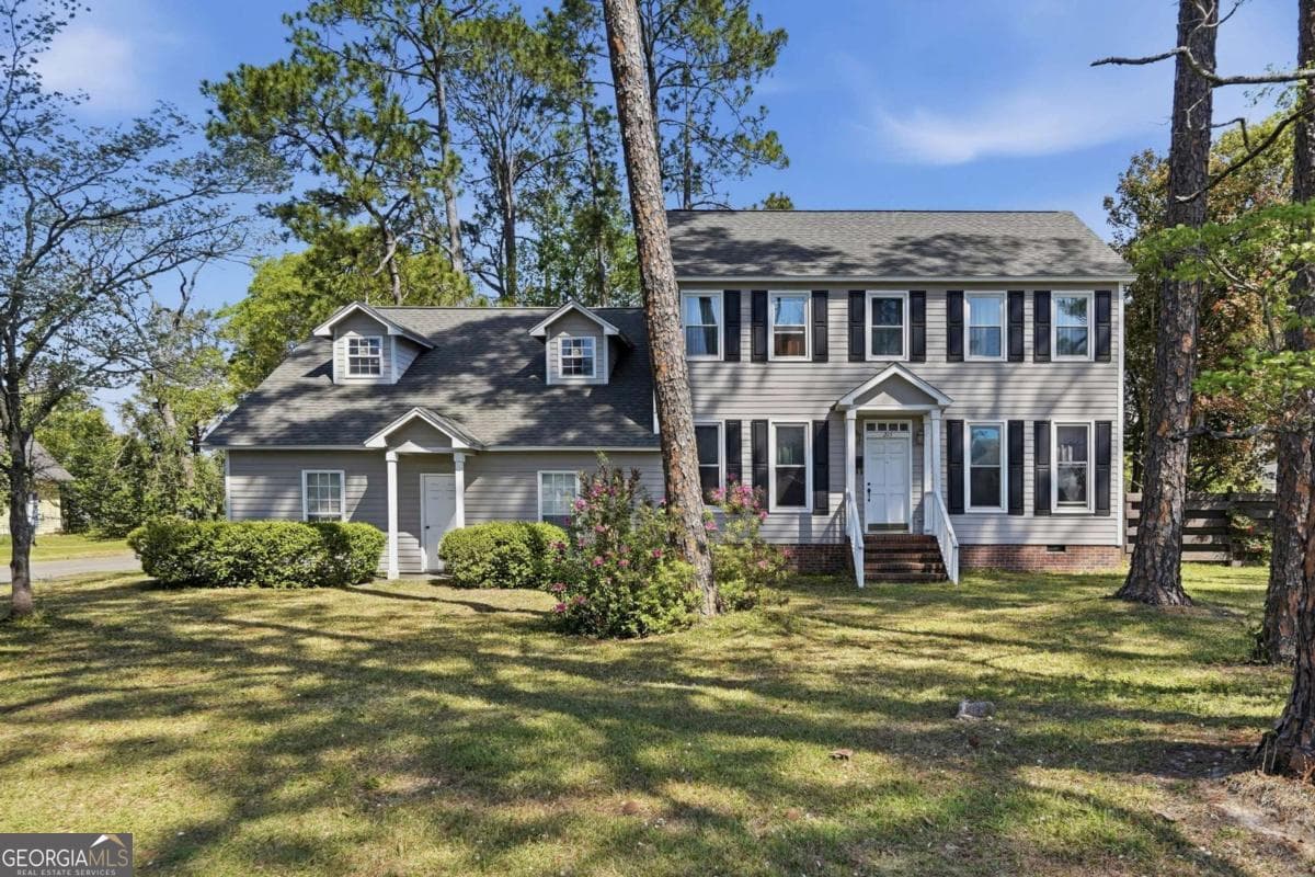 3 bedroom, 2.5 bathroom, 1,716 sq ft single family residence for sale at 215 W Cypress Street, Fitzgerald, GA 31750