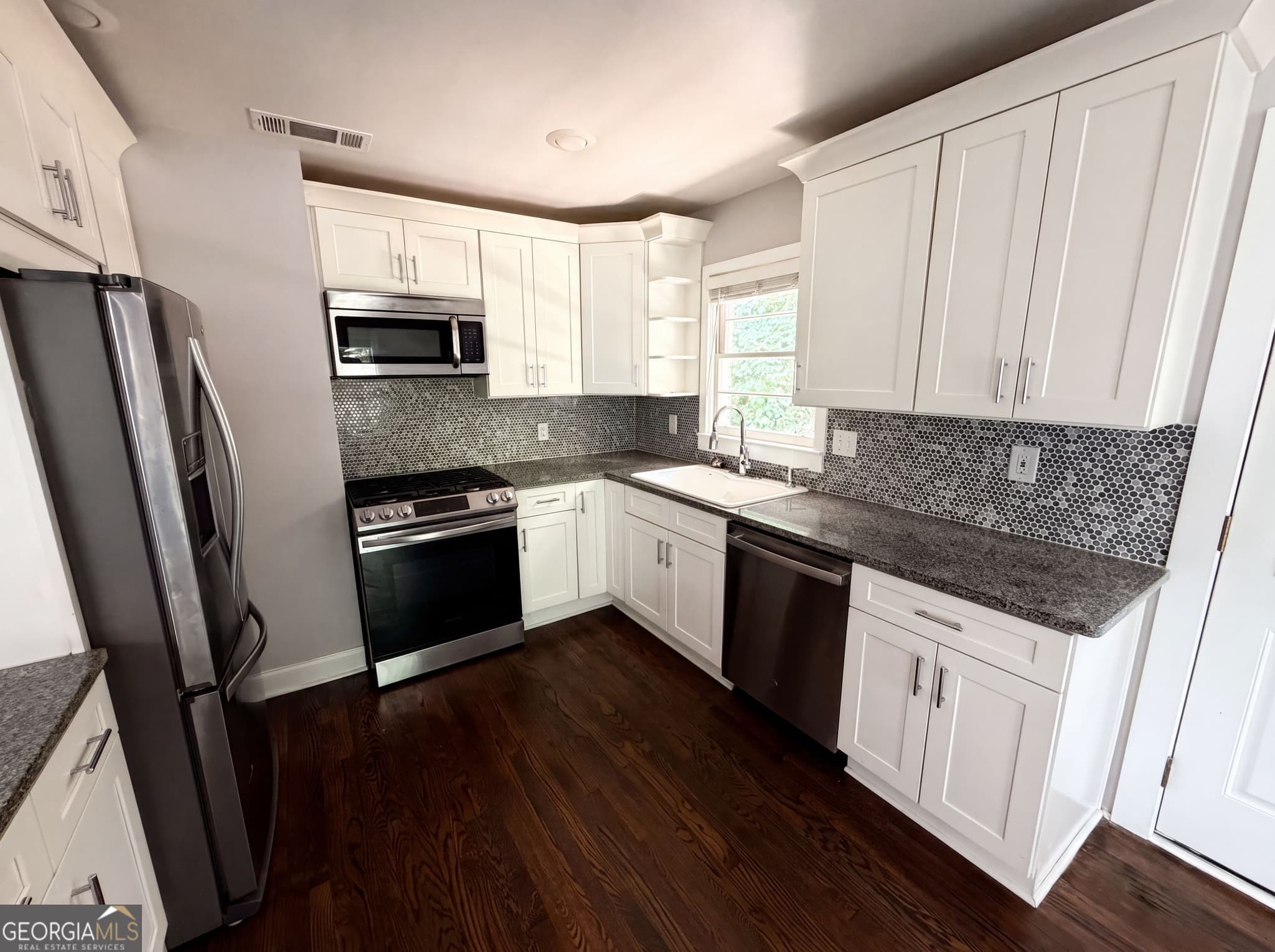 3 bedroom, 2 bathroom, 1,963 sq ft single family residence for sale at 2336 Nesbitt Drive, Brookhaven, GA 30319 — photo 2