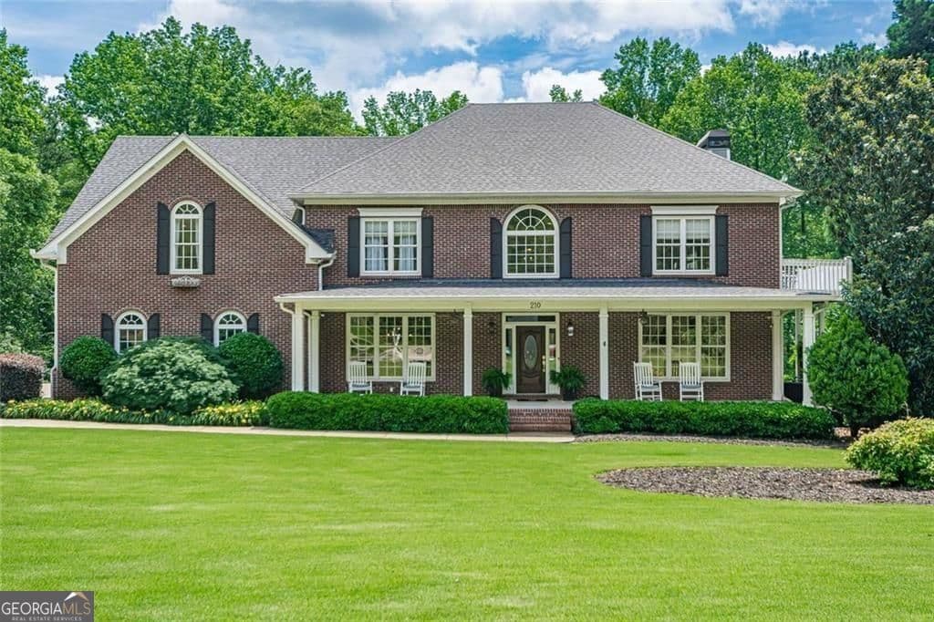 4 bedroom, 4.5 bathroom, 5,939 sq ft single family residence sold at 210 Little River Farms Trail, Canton, GA 30115