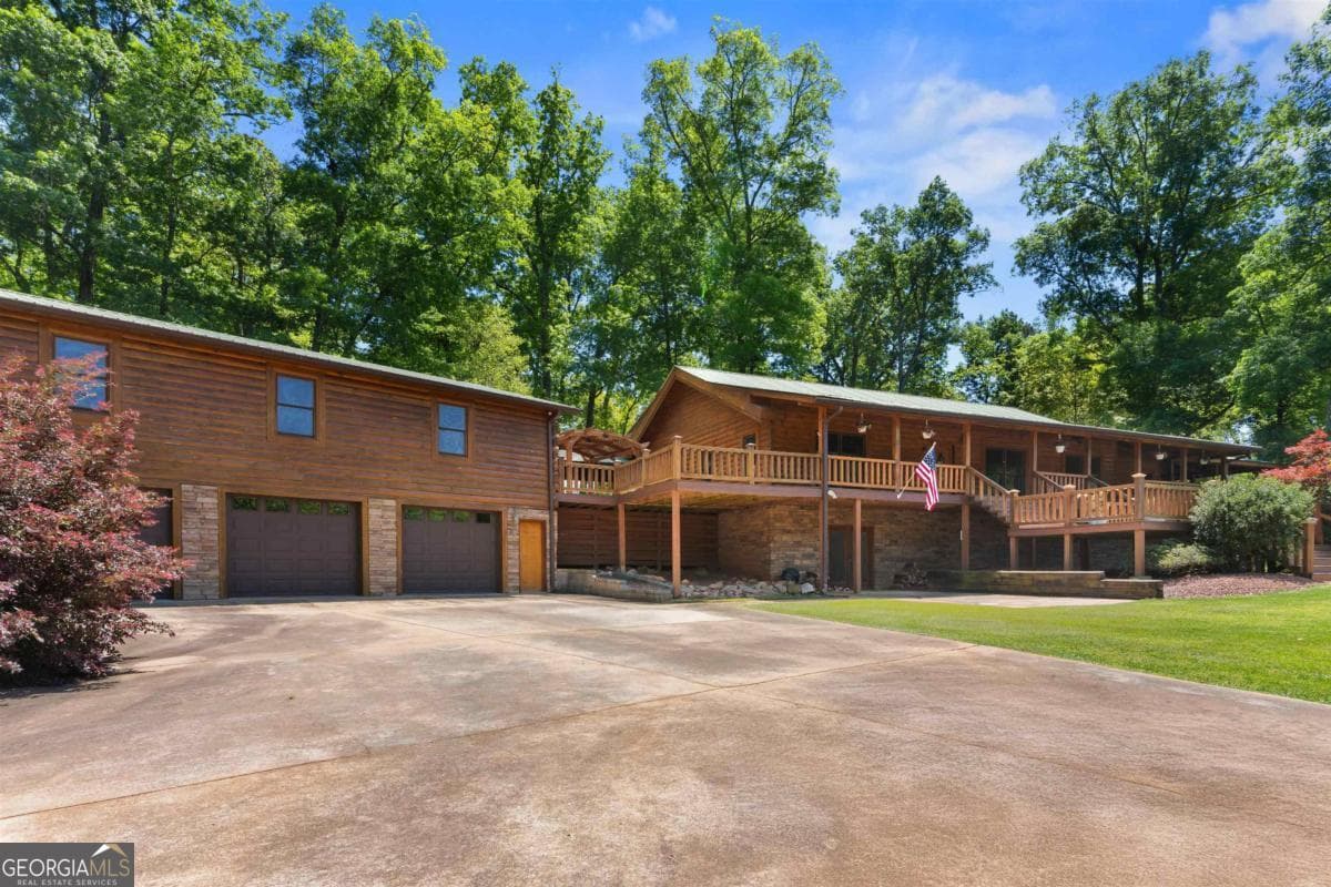 3 bedroom, 2 bathroom, 3,826 sq ft cabin,single family residence for sale at 224 Harmony Road, Eatonton, GA 31024 — photo 2