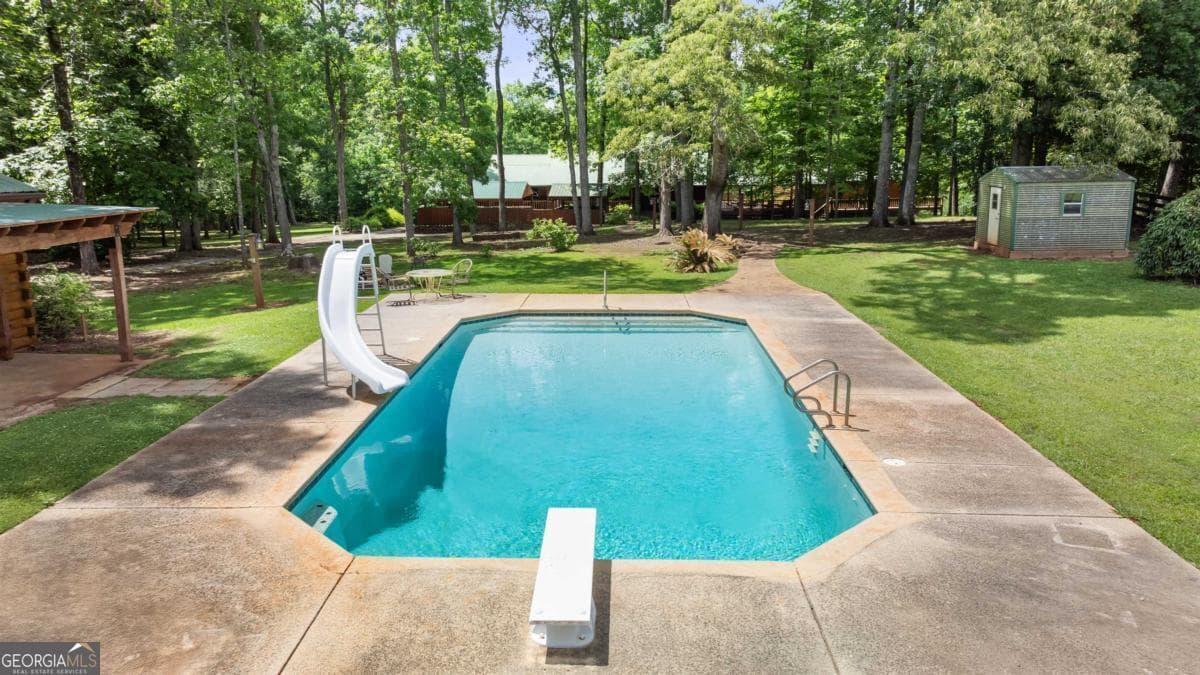 3 bedroom, 2 bathroom, 3,826 sq ft cabin,single family residence for sale at 224 Harmony Road, Eatonton, GA 31024 — photo 10