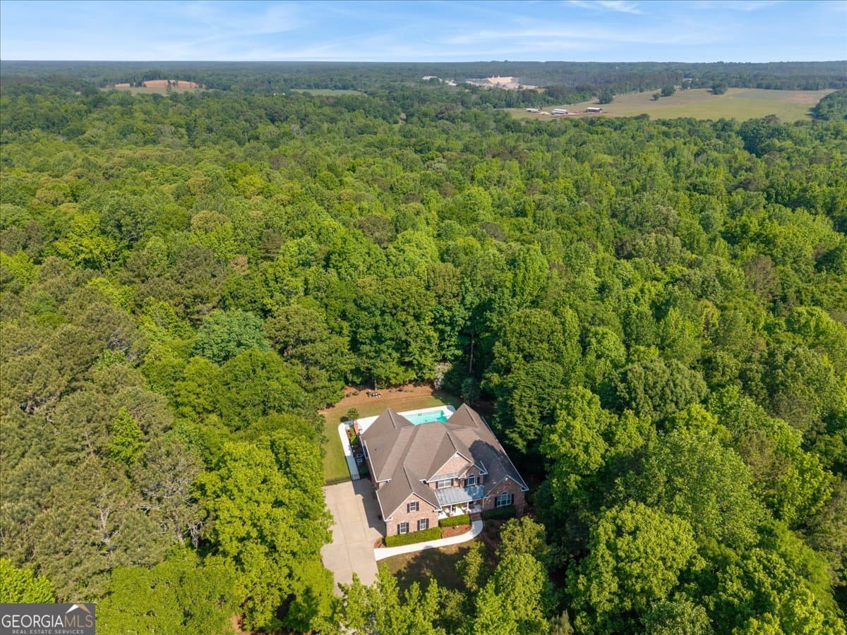8 bedroom, 5 bathroom, 8,302 sq ft single family residence for sale at 1050 Cedar Grove Drive, Buckhead, GA 30625 — photo 3