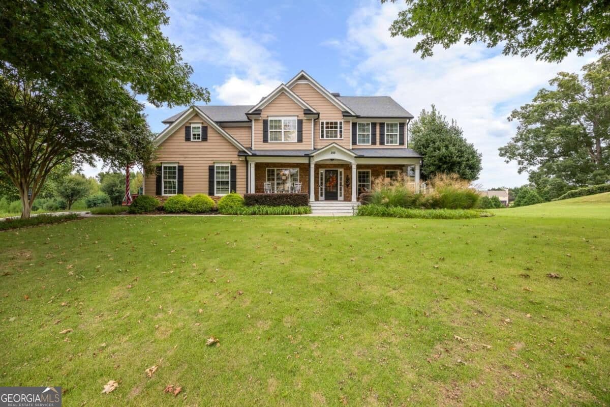 6 bedroom, 4 bathroom, 4,110 sq ft single family residence for sale at 258 Downing Street, Hoschton, GA 30548 — photo 2