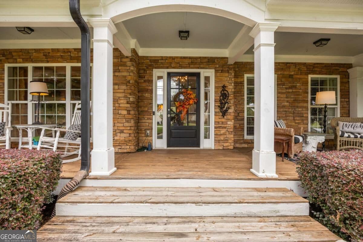 6 bedroom, 4 bathroom, 4,110 sq ft single family residence for sale at 258 Downing Street, Hoschton, GA 30548 — photo 5