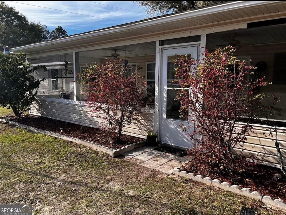 4 bedroom, 2 bathroom, 1,472 sq ft single family residence for sale at 1365 Ballfield Road, Hortense, GA 31543 — photo 2