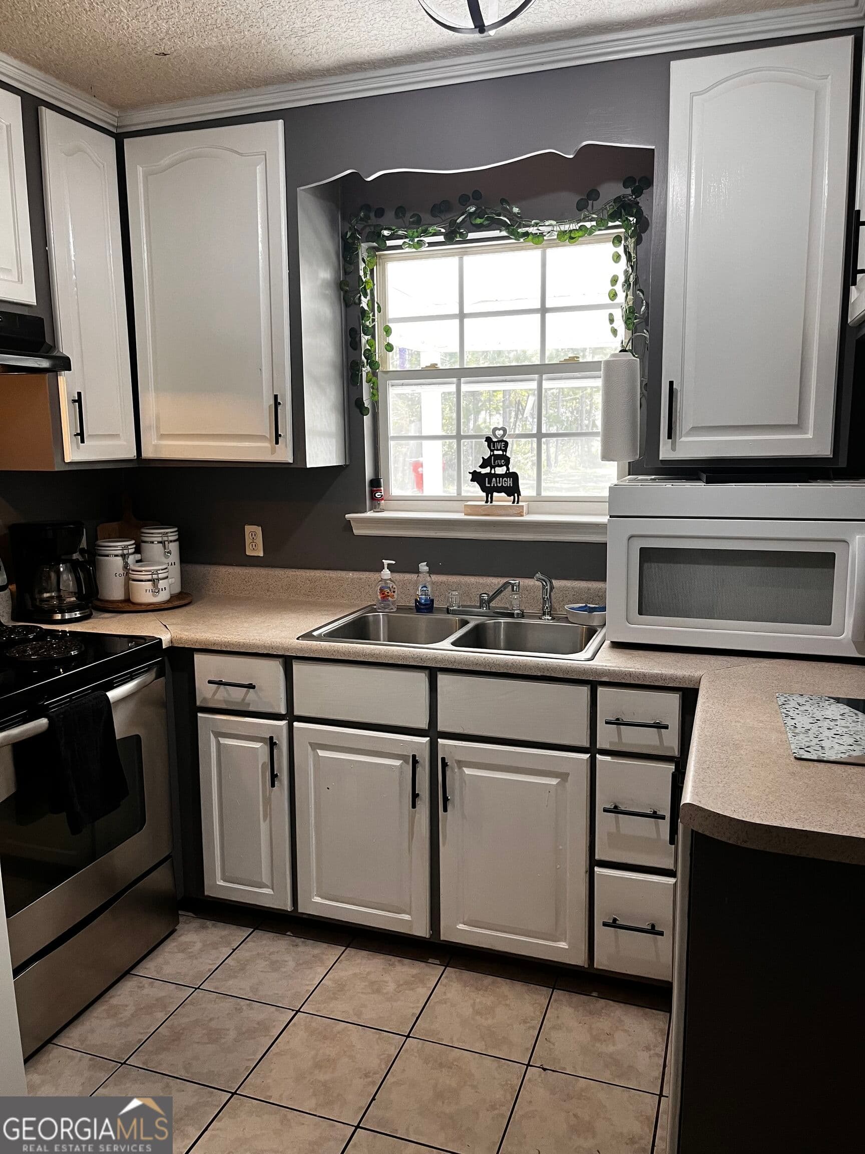 4 bedroom, 2 bathroom, 1,472 sq ft single family residence for sale at 1365 Ballfield Road, Hortense, GA 31543 — photo 5