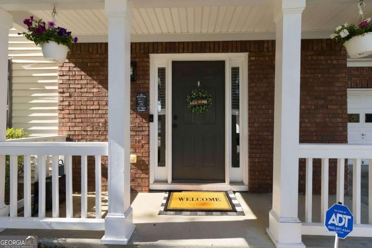 4 bedroom, 2.5 bathroom, 1,922 sq ft single family residence for sale at 2800 General Lee Way, Buford, GA 30519 — photo 2