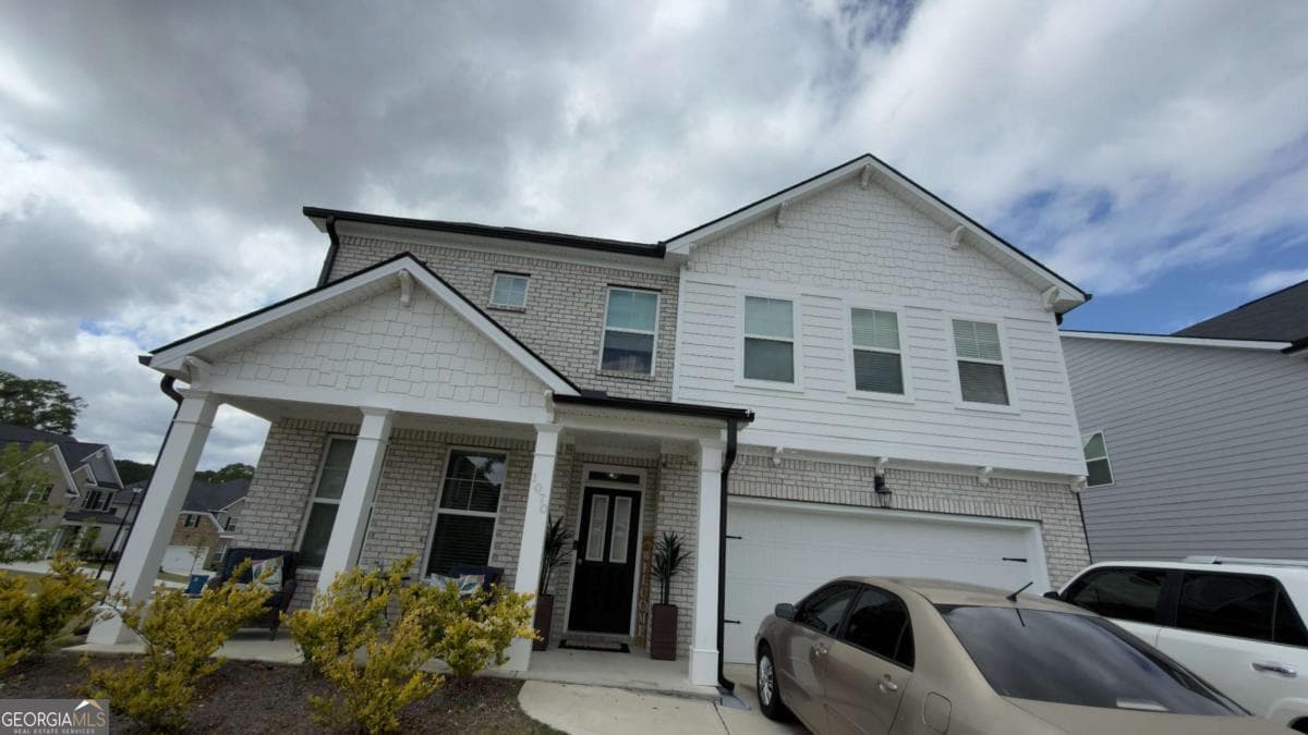 5 bedroom, 4 bathroom single family residence for sale at 1070 Trident Maple, Lawrenceville, GA 30045