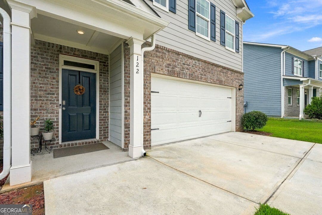 5 bedroom, 3 bathroom, 2,511 sq ft single family residence for sale at 122 Russell Road, Pendergrass, GA 30567 — photo 2