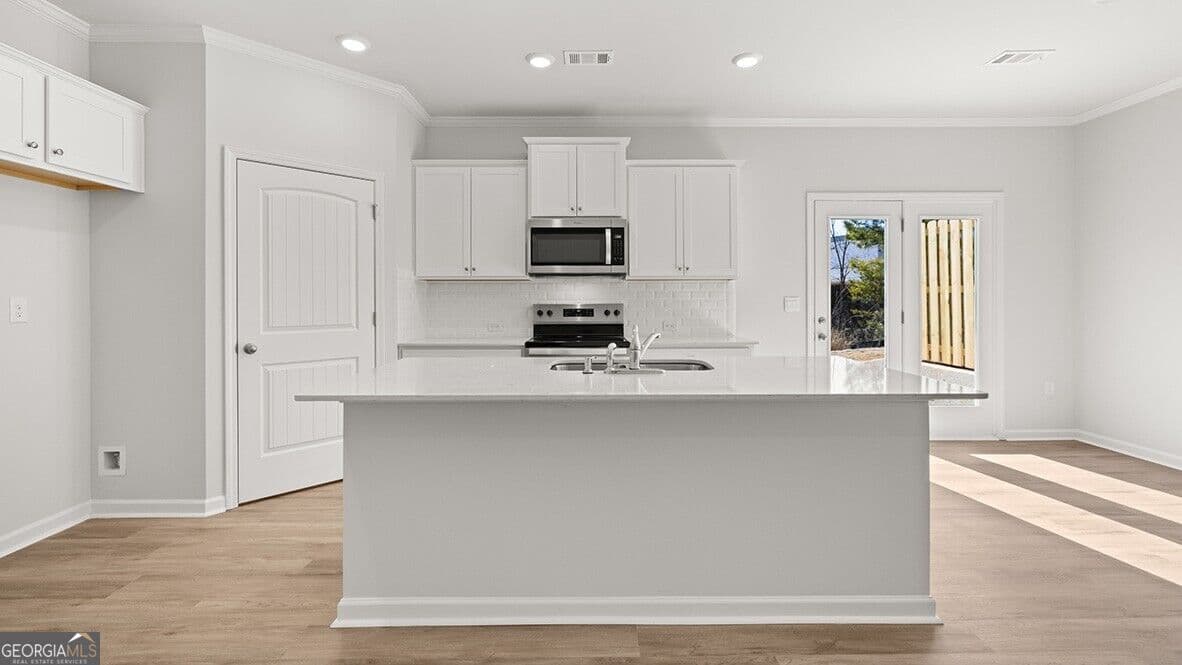 4 bedroom, 2.5 bathroom, 1,877 sq ft single family residence for sale at 4408 Manor Hill Drive, Union City, GA 30291 — photo 4