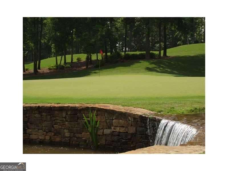 6 bedroom, 7 bathroom, 7,595 sq ft single family residence for sale at 1000 Overlook Terrace, Ball Ground, GA 30107 — photo 10