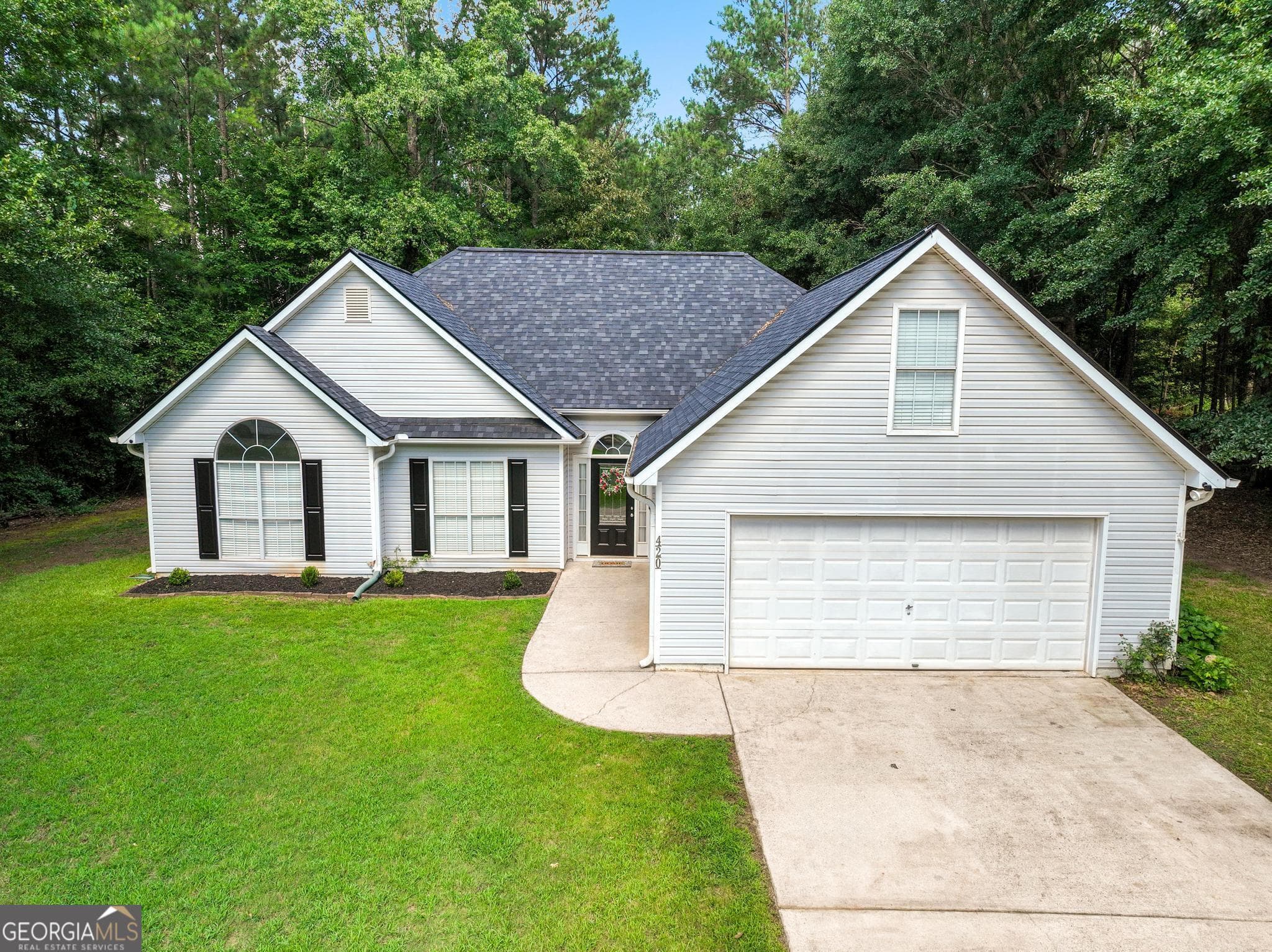 4 bedroom, 2 bathroom, 1,956 sq ft single family residence for sale at 420 Ray Way, Jenkinsburg, GA 30234 — photo 2