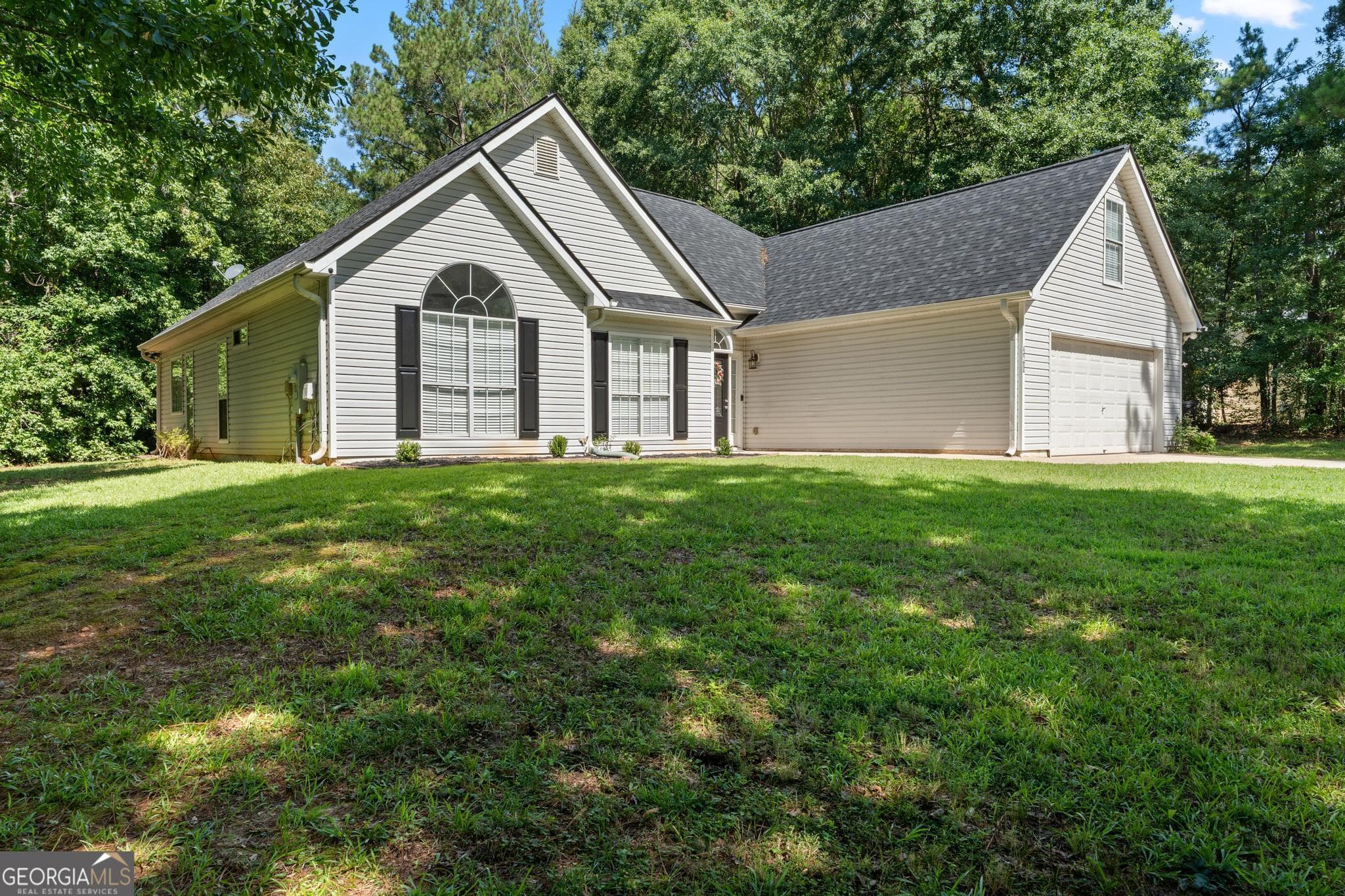 4 bedroom, 2 bathroom, 1,956 sq ft single family residence for sale at 420 Ray Way, Jenkinsburg, GA 30234 — photo 6