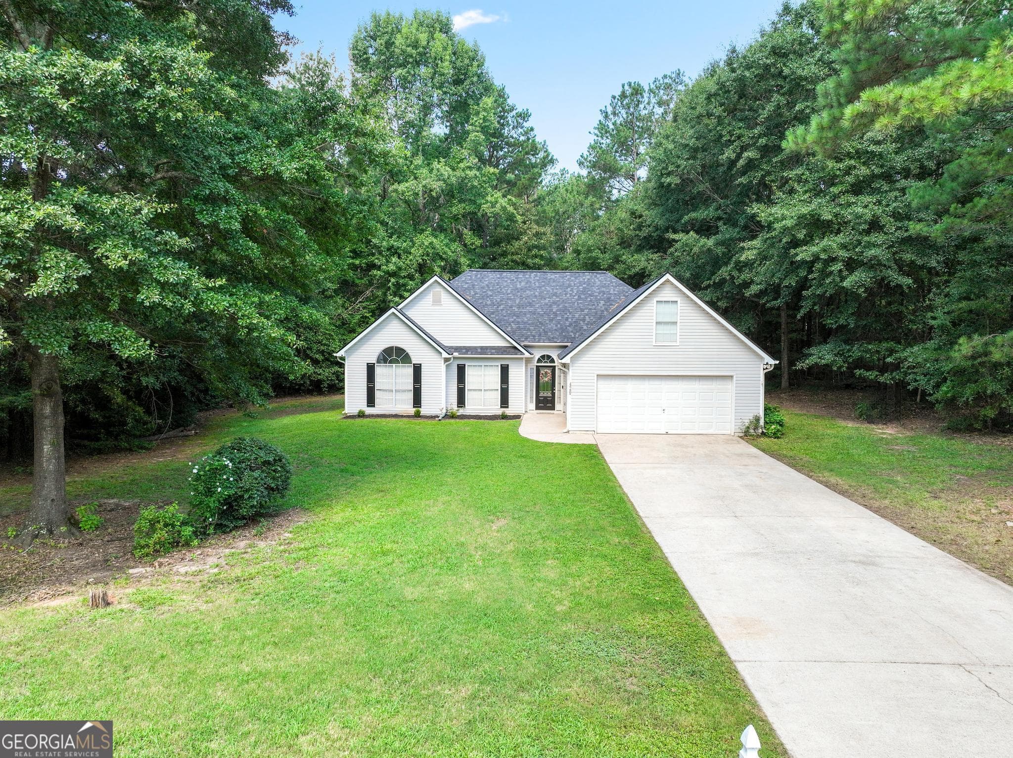 4 bedroom, 2 bathroom, 1,956 sq ft single family residence for sale at 420 Ray Way, Jenkinsburg, GA 30234 — photo 3