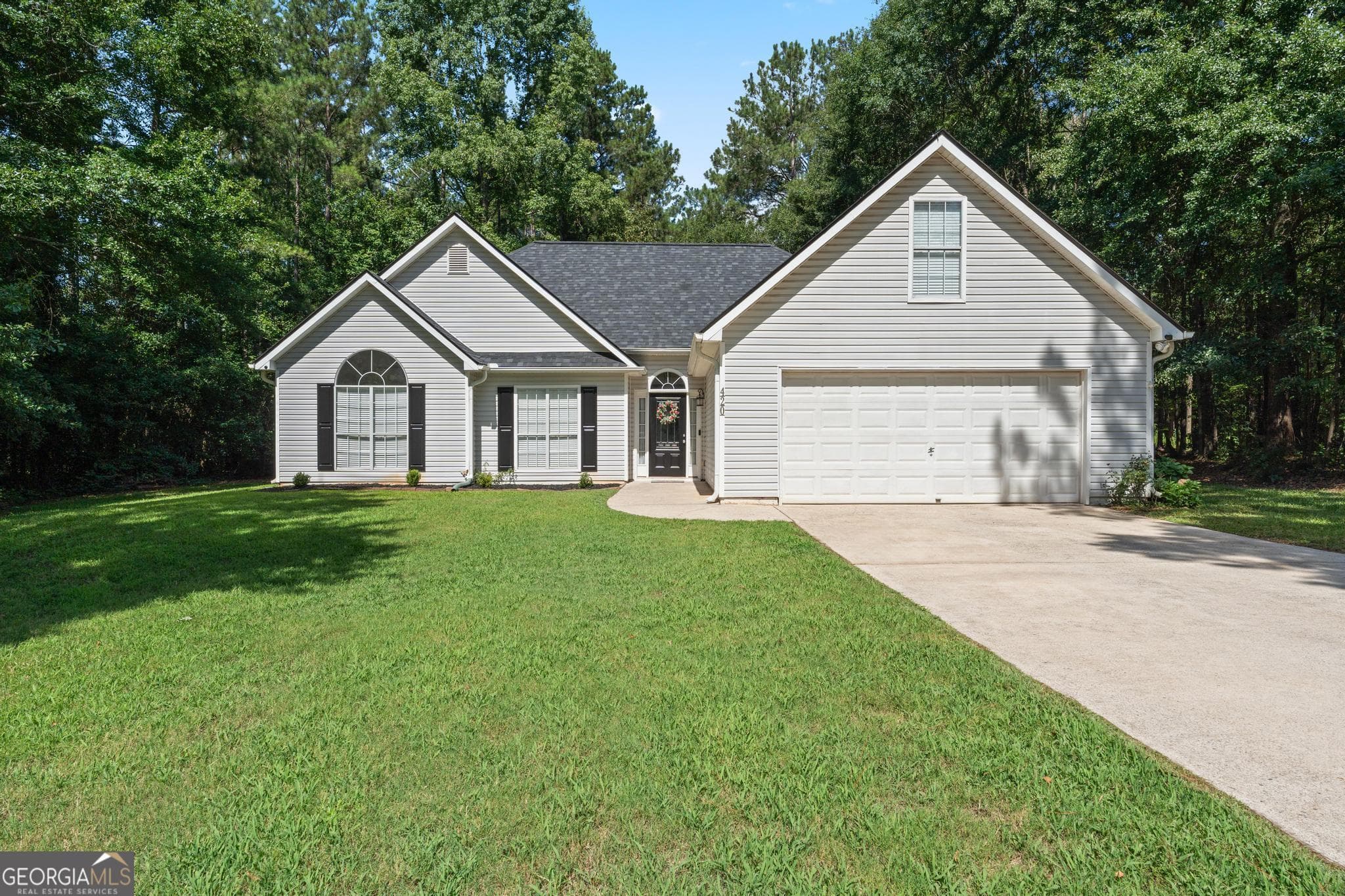 4 bedroom, 2 bathroom, 1,956 sq ft single family residence for sale at 420 Ray Way, Jenkinsburg, GA 30234 — photo 5