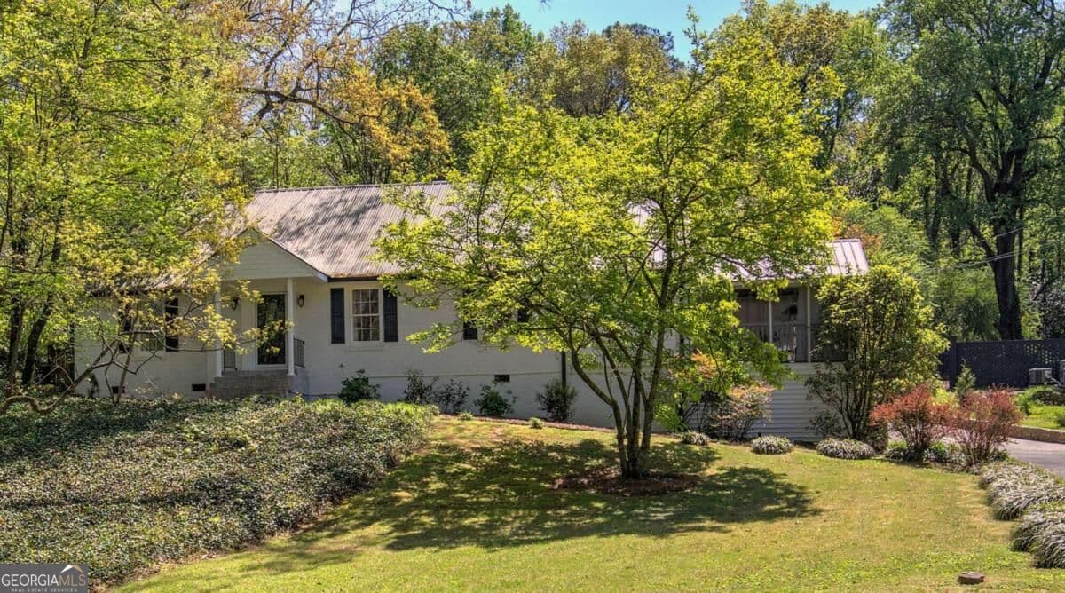 4 bedroom, 2.5 bathroom, 2,593 sq ft single family residence for sale at 323 Trammell Street, Calhoun, GA 30701 — photo 1 of 26