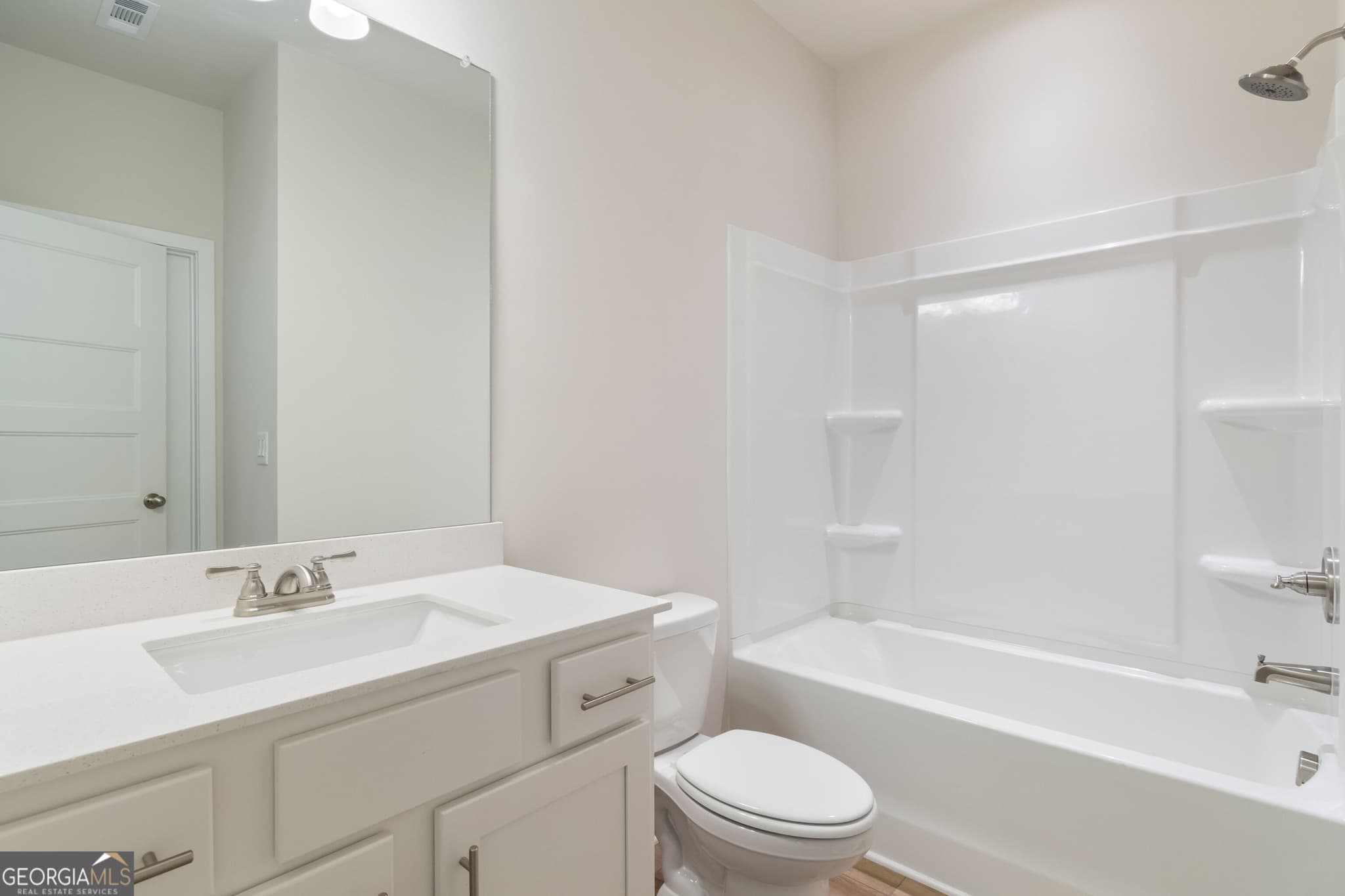 5 bedroom, 4 bathroom, 2,800 sq ft single family residence for sale at 681 Winding Rose Drive, Hoschton, GA 30548 — photo 4