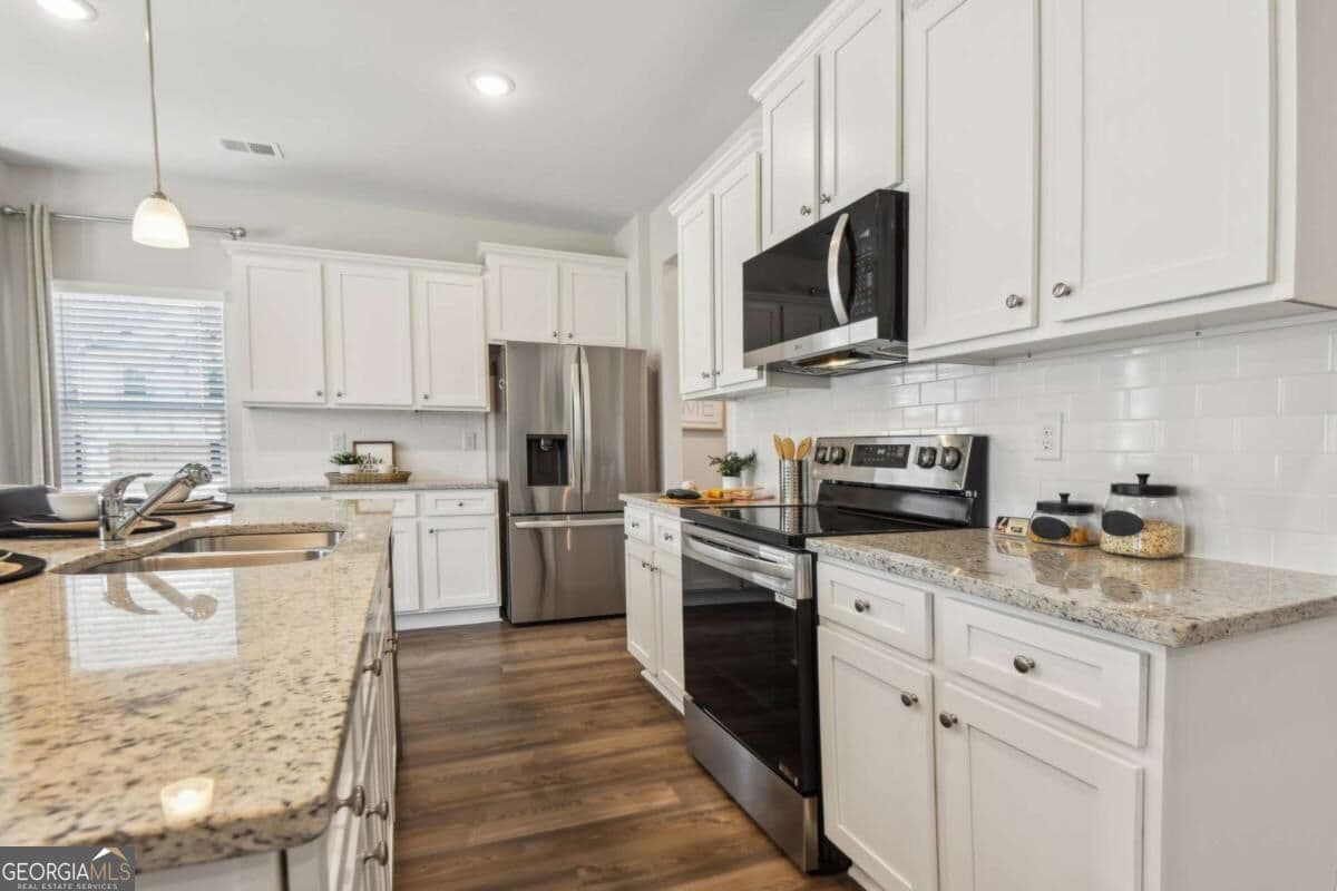 4 bedroom, 2.5 bathroom townhouse for sale at 7055 Old Bridge Lane, Conyers, GA 30013 — photo 10
