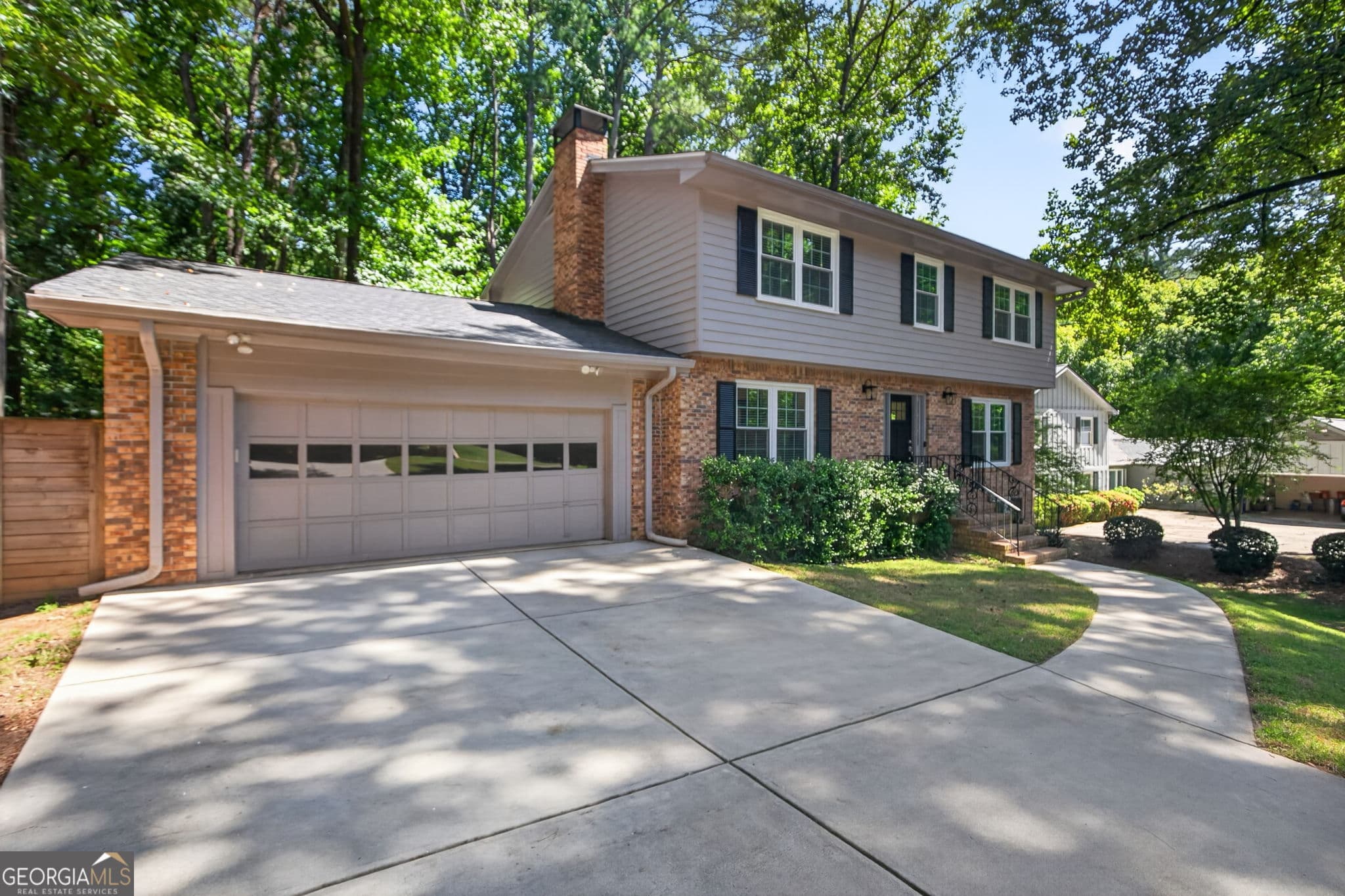 4 bedroom, 2.5 bathroom, 3,703 sq ft single family residence for sale at 4371 Vintage Lane, Dunwoody, GA 30338 — photo 1 of 57