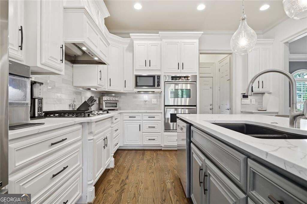 5 bedroom, 5.5 bathroom, 6,662 sq ft single family residence for sale at 1419 Falkirk Lane, Kennesaw, GA 30152 — photo 6