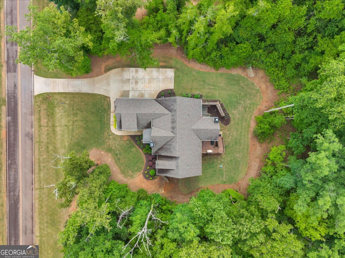 4 bedroom, 3.5 bathroom, 3,160 sq ft single family residence for sale at 103 Heights Avenue, Forsyth, GA 31029 — photo 4