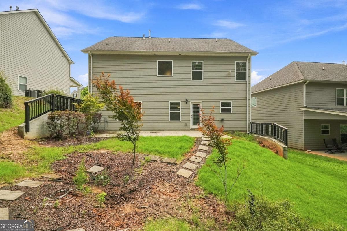 4 bedroom, 2.5 bathroom, 2,774 sq ft single family residence for sale at 6323 Oakwell Place, Fairburn, GA 30213 — photo 7