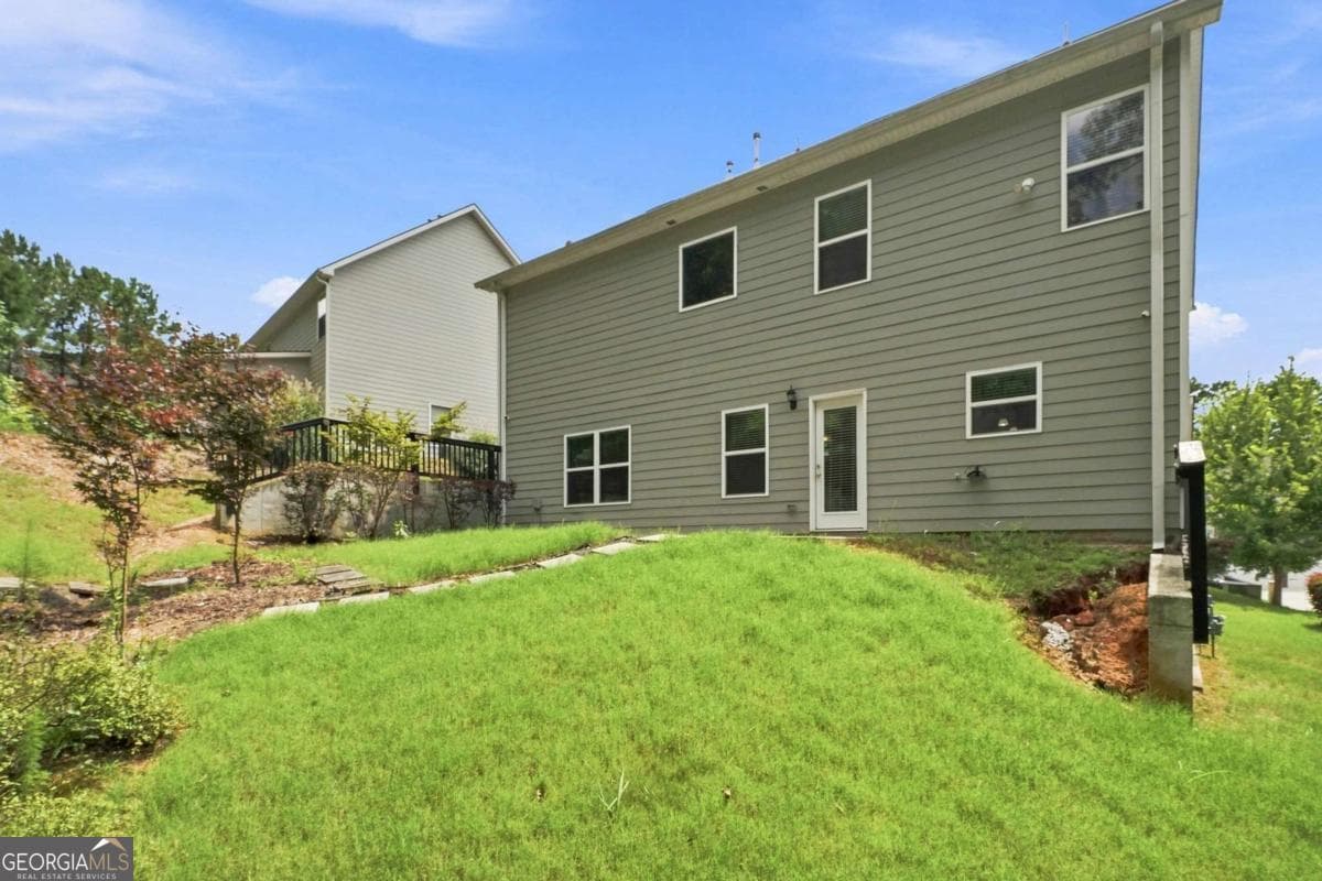 4 bedroom, 2.5 bathroom, 2,774 sq ft single family residence for sale at 6323 Oakwell Place, Fairburn, GA 30213 — photo 8
