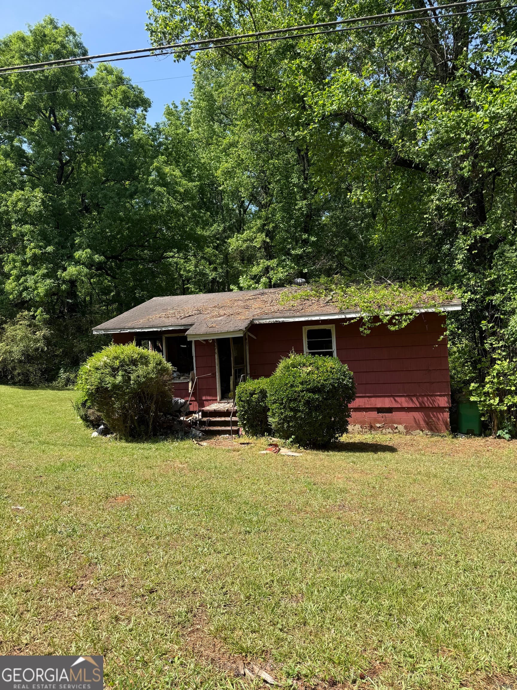 2 bedroom, 1 bathroom, 768 sq ft single family residence sold at 6275 Shadow Rock Drive, Lithonia, GA 30058