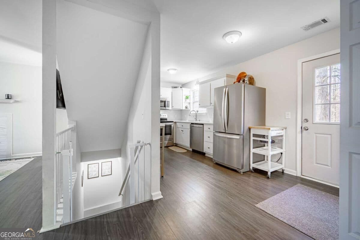 3 bedroom, 2 bathroom, 1,512 sq ft single family residence for sale at 2310 Fleetwood Drive, Cumming, GA 30041 — photo 8
