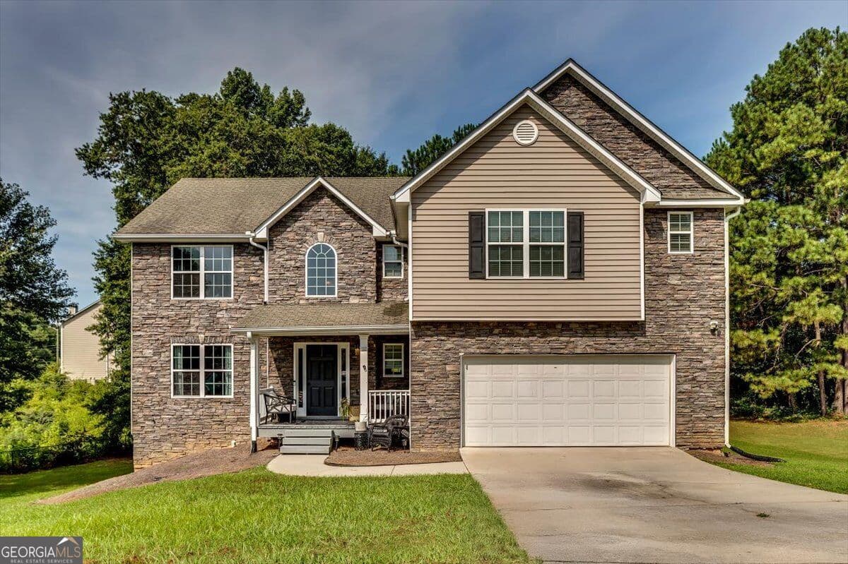 5 bedroom, 3.5 bathroom, 4,177 sq ft single family residence for sale at 1616 Tusk Trail, Conyers, GA 30012 — photo 1 of 45