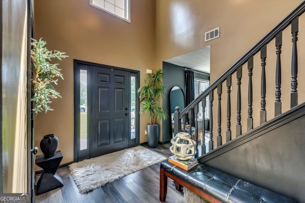 5 bedroom, 3.5 bathroom, 4,177 sq ft single family residence for sale at 1616 Tusk Trail, Conyers, GA 30012 — photo 4