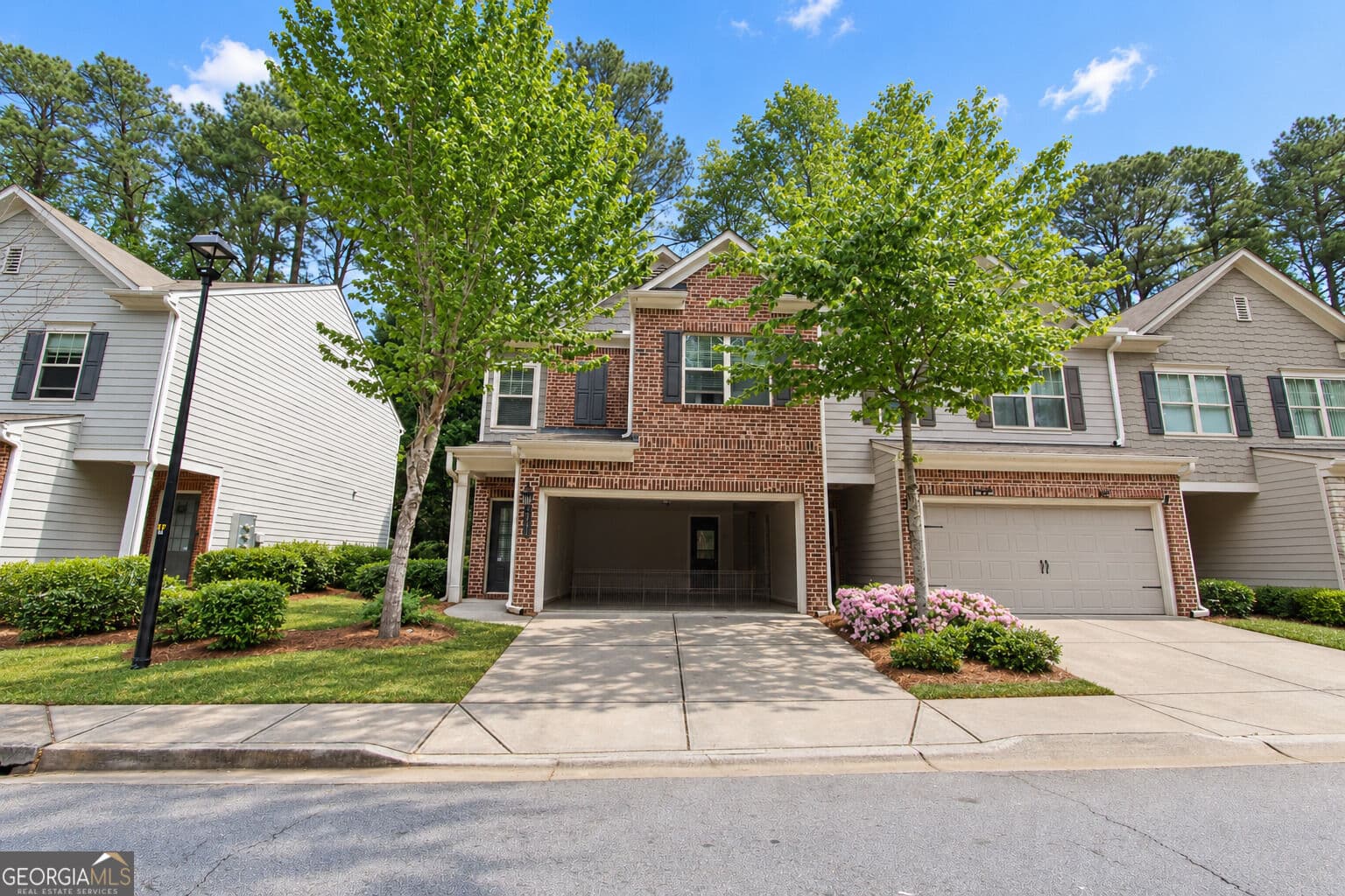 3 bedroom, 2.5 bathroom, 1,836 sq ft townhouse for sale at 2431 Norwood Park Crossing, Atlanta, GA 30340 — photo 1 of 38