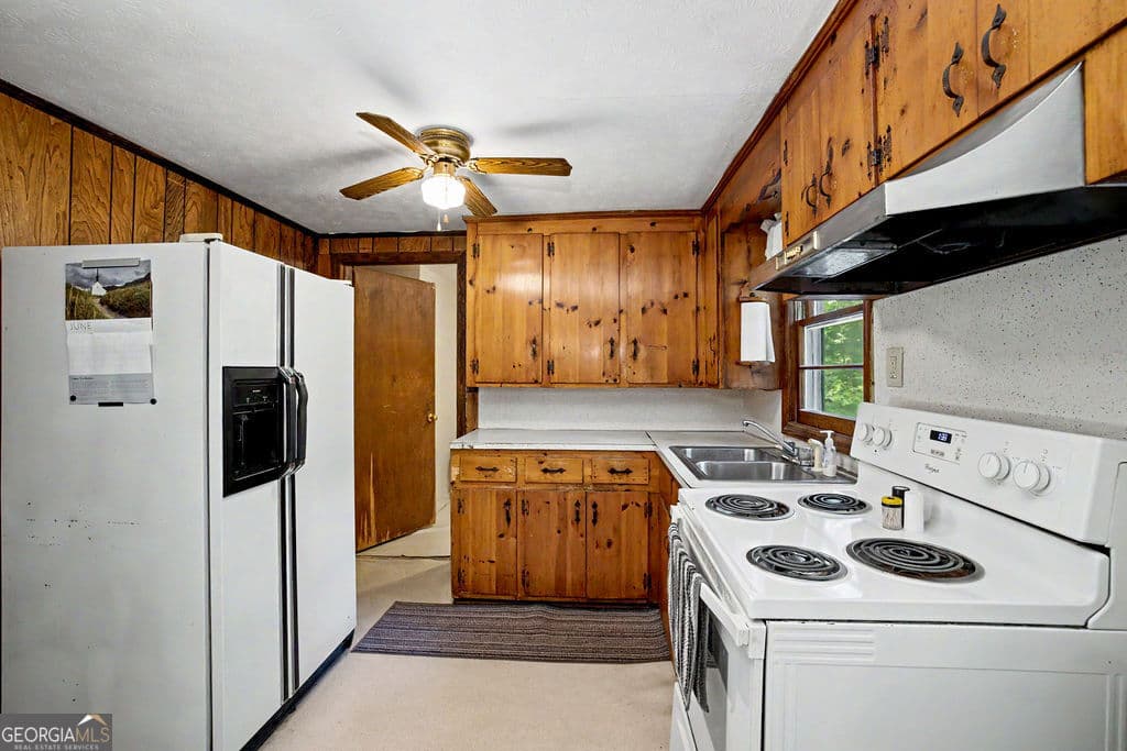 4 bedroom, 2 bathroom, 1,280 sq ft single family residence for sale at 1665 Kansas Jake Road, Waco, GA 30182 — photo 5