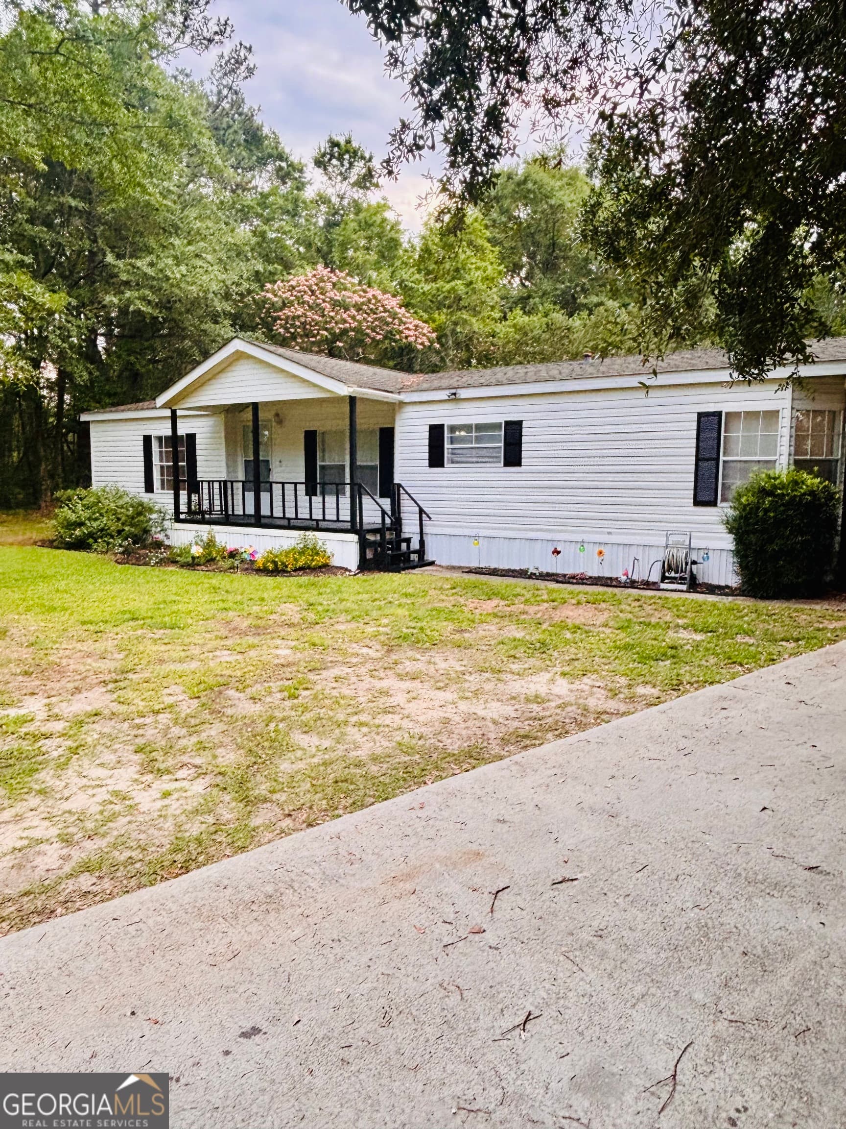 3 bedroom, 2 bathroom, 1,700 sq ft manufactured home,single family residence for sale at 323 S Grady Street, Portal, GA 30450 — photo 2