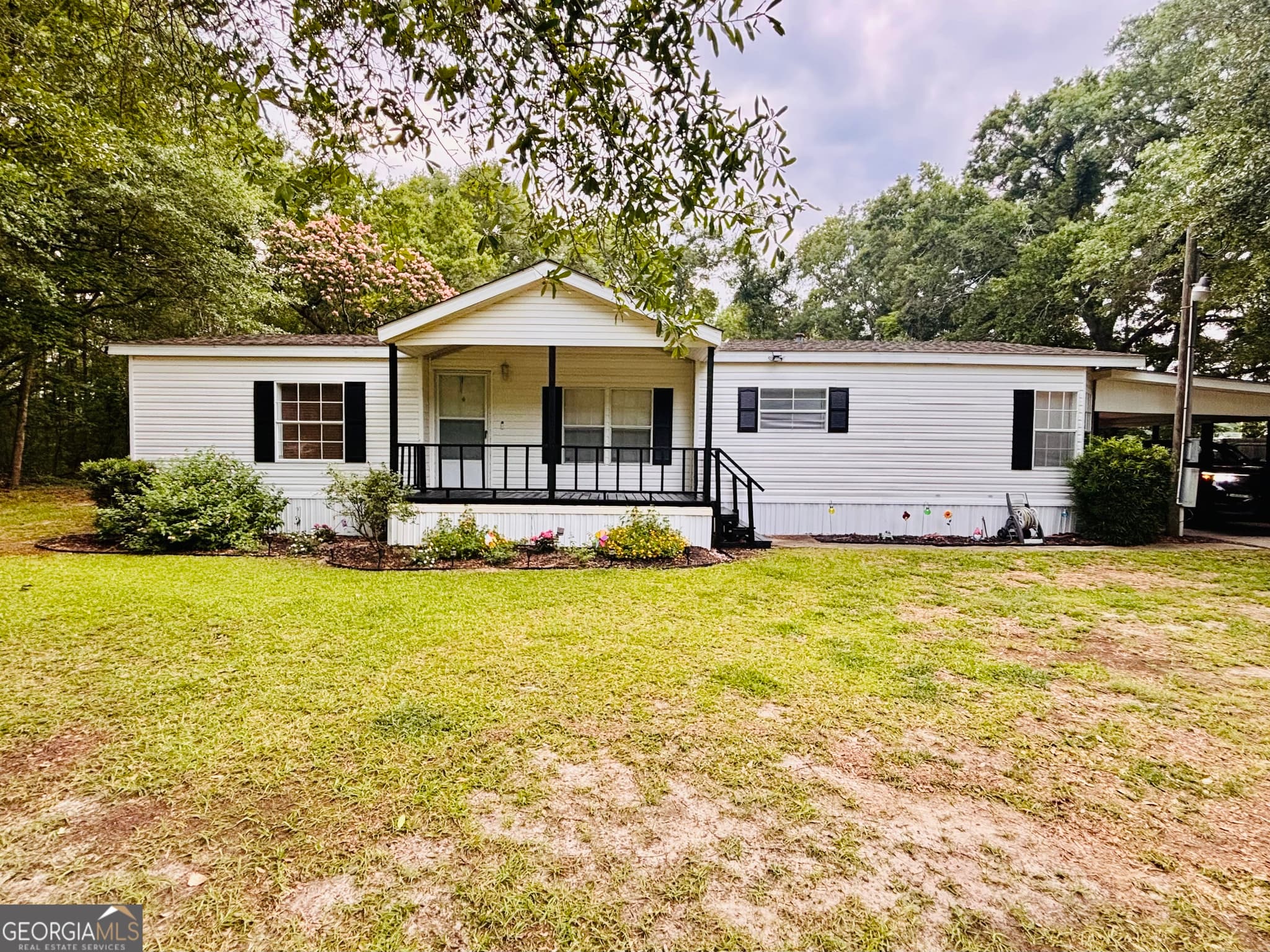 3 bedroom, 2 bathroom, 1,700 sq ft manufactured home,single family residence for sale at 323 S Grady Street, Portal, GA 30450 — photo 3