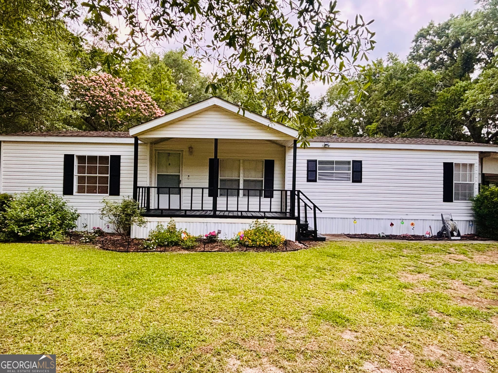 3 bedroom, 2 bathroom, 1,700 sq ft manufactured home,single family residence for sale at 323 S Grady Street, Portal, GA 30450 — photo 4
