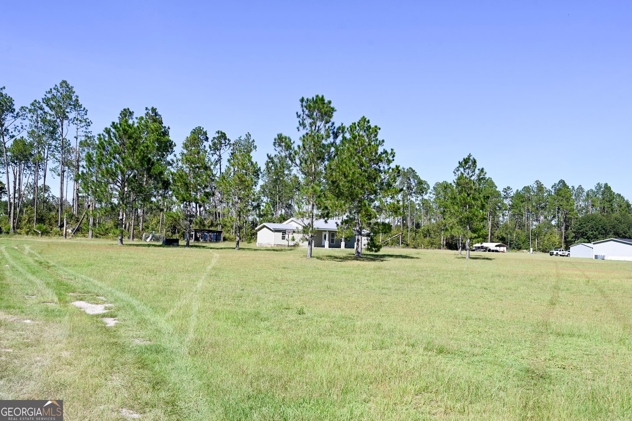 4 bedroom, 2 bathroom, 1,632 sq ft single family residence for sale at 325 New Hope Church Road, Alma, GA 31510 — photo 2