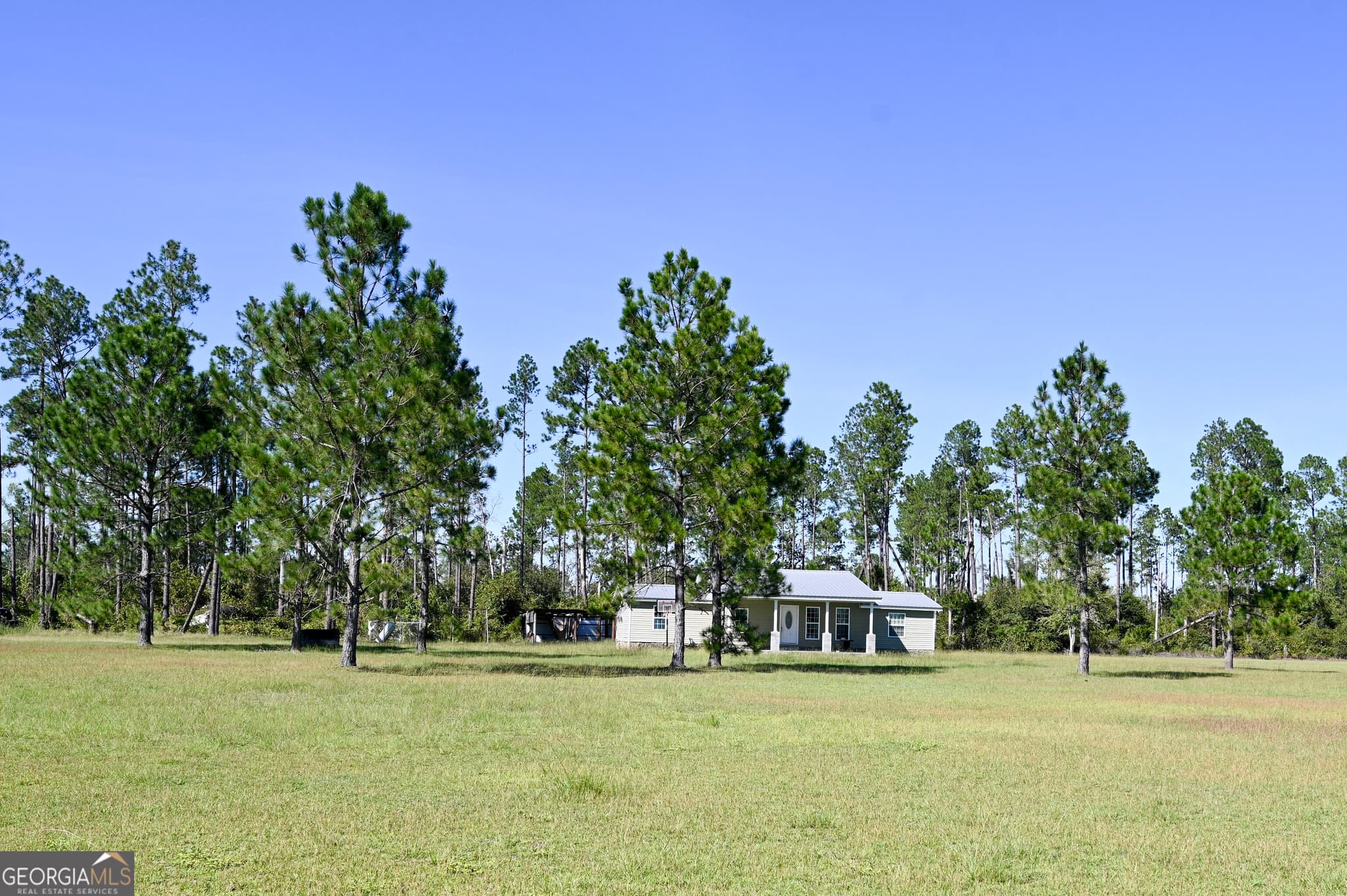 4 bedroom, 2 bathroom, 1,632 sq ft single family residence for sale at 325 New Hope Church Road, Alma, GA 31510 — photo 3