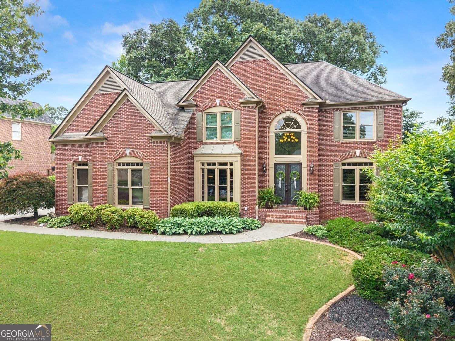 4 bedroom, 4 bathroom, 4,546 sq ft single family residence sold at 5225 McIntosh Drive, Cumming, GA 30040